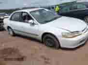 2000 Honda Accord LX z VIN 1HGCG5641YA131445, wystawiony jako IAAI lot #42441064 z przebiegiem 208 017 mil mil oraz . Historia ofert i sprzedaży dostępna na DreamBid. Obrazek 1.