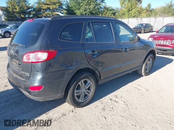 2011 Hyundai Santa Fe GLS z VIN 5XYZGDAB2BG083969, wystawiony jako IAAI lot #43480300 z przebiegiem 149 012 mil mil oraz . Historia ofert i sprzedaży dostępna na DreamBid. Obrazek 4.