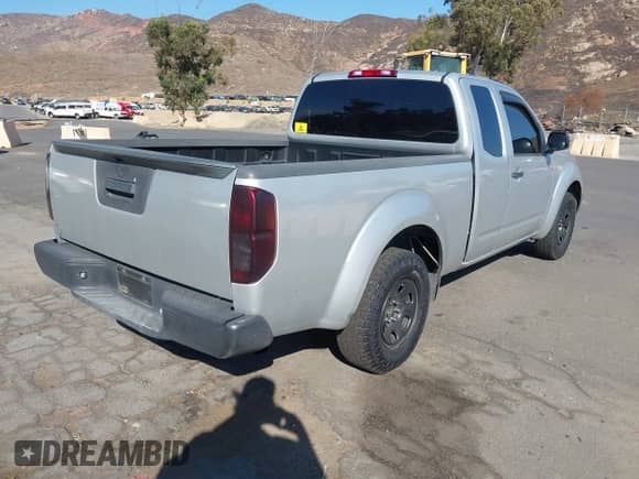 2014 Nissan Frontier S with VIN 1N6BD0CT9EN725073, listed as a IAAI auction lot 43272606 with 198,548 mi miles and . Bid and sale history available at DreamBid. Image 4.