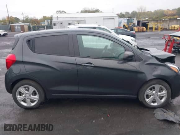 2022 Chevrolet Spark LS z VIN KL8CA6SA6NC015782, wystawiony jako IAAI lot #43419207 z przebiegiem 86 066 mil mil oraz . Historia ofert i sprzedaży dostępna na DreamBid. Obrazek 13.