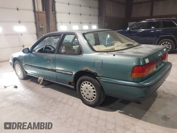 1993 Honda Accord z VIN 1HGCB7253PA033802, wystawiony jako IAAI lot #41624772 z przebiegiem 143 400 mil mil oraz . Historia ofert i sprzedaży dostępna na DreamBid. Obrazek 3.