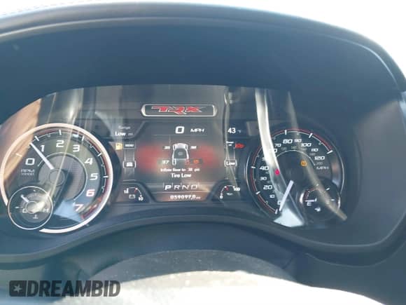 2021 Ram 1500 TRX с VIN 1C6SRFU99MN758770, выставлен на аукционе IAAI как лот 38873371 с пробегом 59 097 миль миль и . История ставок и продаж доступна на DreamBid. Изображение 7.