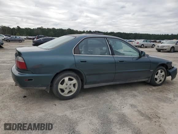 1997 Honda Accord LX with VIN 1HGCD5638VA053287, listed as a Copart auction lot 71704015 with 332,299 mi miles and Clean title. Bid and sale history available at DreamBid. Image 3.
