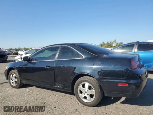 2001 Honda Accord EX with VIN 1HGCG32731A007431, listed as a Copart auction lot 80572485 with 127,241 mi miles and Salvage title. Bid and sale history available at DreamBid. Image 2.