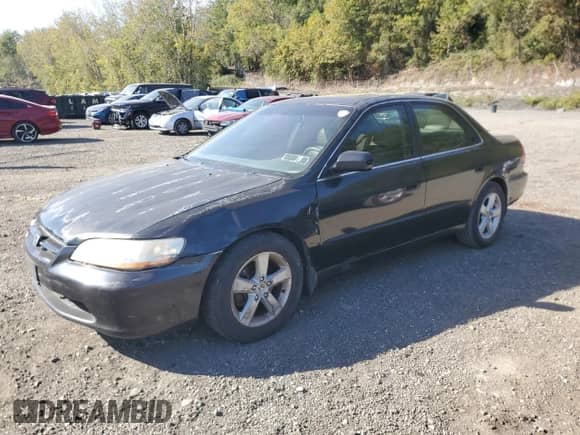 1998 Honda Accord EX with VIN 1HGCG1653WA033449, listed as a Copart auction lot 84936845 with 268,201 mi miles and Salvage title. Bid and sale history available at DreamBid. Image 1.