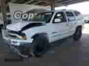 2002 Chevrolet Tahoe Z71 with VIN 1GNEK13T02R315463, listed as a Copart auction lot 84622345 with 164,231 mi miles and Salvage title. Bid and sale history available at DreamBid. Image 1.