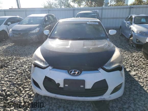 2012 Hyundai Veloster w/Gray Int z VIN KMHTC6AD3CU021197, wystawiony jako Copart lot #84803605 z przebiegiem 170 338 mil mil oraz Szkoda całkowita • Salvage title. Historia ofert i sprzedaży dostępna na DreamBid. Obrazek 6.