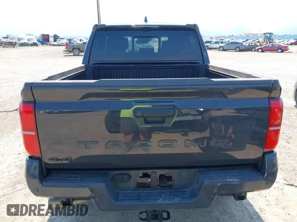 2024 Toyota Tacoma TRD Off Road with VIN 3TMLB5JN7RM069938, listed as a IAAI auction lot 43056789 with 6,837 mi miles and . Bid and sale history available at DreamBid. Image 16.
