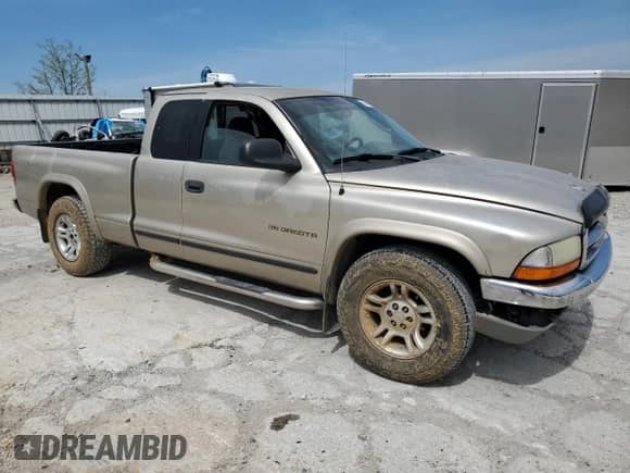 2002 Dodge Dakota SLT с VIN 1B7GL42X52S664437, выставлен на аукционе Copart как лот 50849984 с пробегом 175 062 миль миль и Списание • Salvage title. История ставок и продаж доступна на DreamBid. Изображение 4.