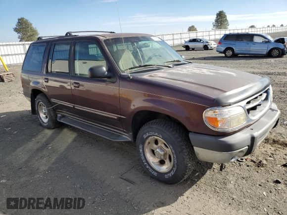 1999 Ford Explorer XL с VIN 1FMZU34X4XZB14315, выставлен на аукционе Copart как лот 75139544 с пробегом 198 461 миль миль и Чистый • Clean title. История ставок и продаж доступна на DreamBid. Изображение 4.