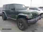 2007 Jeep Wrangler Unlimited Sahara z VIN 1J4GA59147L218594, wystawiony jako IAAI lot #42984397 z przebiegiem 108 296 mil mil oraz . Historia ofert i sprzedaży dostępna na DreamBid. Obrazek 1.