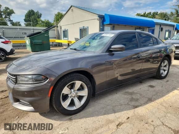 2015 Dodge Charger SE with VIN 2C3CDXBG7FH726886, listed as a Copart auction lot 80687465 with 153,436 mi miles and Salvage title. Bid and sale history available at DreamBid. Image 1.