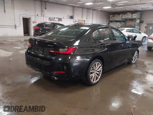 2023 BMW 3 Series 330i xDrive with VIN 3MW89FF00P8D57937, listed as a IAAI auction lot 43081403 with 19,195 mi miles and . Bid and sale history available at DreamBid. Image 4.