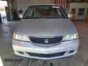 2001 Honda Odyssey EX с VIN 2HKRL18611H611799, выставлен на аукционе Copart как лот 90270845 с пробегом 279 565 миль миль и Списание • Salvage title. История ставок и продаж доступна на DreamBid. Изображение 5.