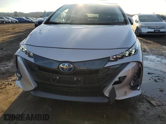 2022 Toyota Prius Limited with VIN JTDKAMFPXN3210371, listed as a Copart auction lot 87244264 with 55,591 mi miles and Salvage title. Bid and sale history available at DreamBid. Image 5.