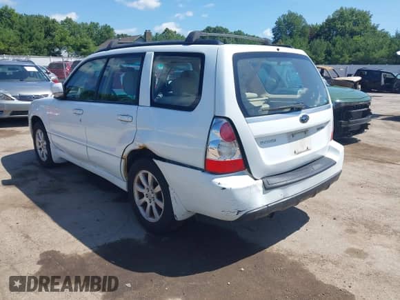 2007 Subaru Forester X z VIN JF1SG656X7H733369, wystawiony jako IAAI lot #42625071 z przebiegiem 148 877 mil mil oraz . Historia ofert i sprzedaży dostępna na DreamBid. Obrazek 6.