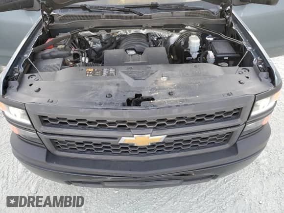 2014 Chevrolet Silverado 1500 Work Truck z VIN 1GCNCPEH8EZ226861, wystawiony jako Copart lot #70095275 z przebiegiem 150 669 mil mil oraz Szkoda całkowita • Salvage title. Historia ofert i sprzedaży dostępna na DreamBid. Obrazek 11.