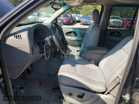 2005 Chevrolet TrailBlazer LT с VIN 1GNDS13S452386147, выставлен на аукционе Copart как лот 69650355 с пробегом 214 407 миль миль и Списание • Salvage title. История ставок и продаж доступна на DreamBid. Изображение 7.