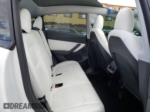 2021 Tesla Model Y Long Range with VIN 5YJYGDEE8MF092993, listed as a Copart auction lot 81125165 with 47,072 mi miles and Non repairable. Bid and sale history available at DreamBid. Image 10.