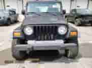 2004 Jeep Wrangler SE z VIN 1J4FA29164P793438, wystawiony jako Copart lot #71223435 z przebiegiem 159 757 mil mil oraz Szkoda całkowita • Salvage title. Historia ofert i sprzedaży dostępna na DreamBid. Obrazek 5.