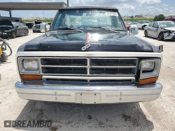 1987 Dodge Trucks with VIN 1B7HD14T9HS384894, listed as a Copart auction lot 57977035 with 98,864 mi miles and Salvage title. Bid and sale history available at DreamBid. Image 5.