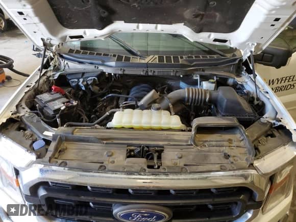 2022 Ford F-150 XL z VIN 1FTFW1E59NKE56500, wystawiony jako Copart lot #63595185 z przebiegiem 39 270 mil mil oraz Szkoda całkowita • Salvage title. Historia ofert i sprzedaży dostępna na DreamBid. Obrazek 11.