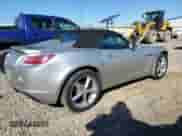 2009 Saturn Sky Red Line с VIN 1G8MT35X59Y104413, выставлен на аукционе Copart как лот 84166785 с пробегом 82 261 миль миль и Списание • Salvage title. История ставок и продаж доступна на DreamBid. Изображение 3.