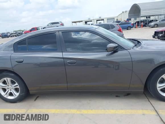 2019 Dodge Charger SXT with VIN 2C3CDXBG7KH707734, listed as a IAAI auction lot 42659110 with 68,600 mi miles and . Bid and sale history available at DreamBid. Image 13.