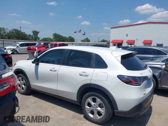 2023 Honda HR-V LX с VIN 3CZRZ1H3XPM743705, выставлен на аукционе IAAI как лот 42331612 с пробегом 24 452 миль миль и . История ставок и продаж доступна на DreamBid. Изображение 14.