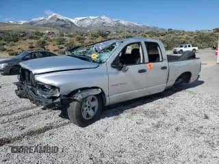 2002 Dodge 1500 with VIN 3D7HA18Z22G146218, listed as a Copart auction lot 54786995 with 174,528 mi miles and Salvage title. Bid and sale history available at DreamBid. Image 1.
