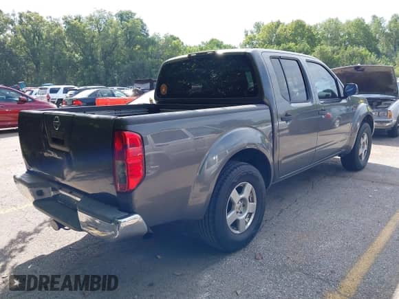 2008 Nissan Frontier SE with VIN 1N6AD07UX8C405274, listed as a IAAI auction lot 43000960 with 207,756 mi miles and . Bid and sale history available at DreamBid. Image 4.