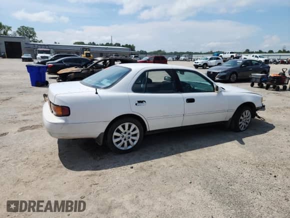 1992 Toyota Camry LE с VIN 4T1SK12E3NU117763, выставлен на аукционе Copart как лот 64245365 с пробегом 293 640 миль миль и Списание • Salvage title. История ставок и продаж доступна на DreamBid. Изображение 3.