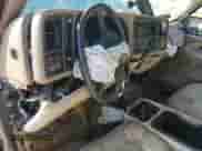 2002 Chevrolet Suburban LS с VIN 1GNFK16Z02J192587, выставлен на аукционе Copart как лот 68169004 с пробегом Не указан миль и На запчасти • Non repairable. История ставок и продаж доступна на DreamBid. Изображение 8.