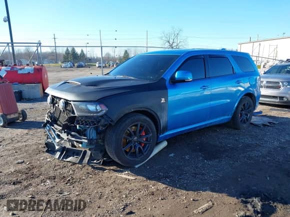 2018 Dodge Durango SRT with VIN 1C4SDJGJ1JC415720, listed as a IAAI auction lot 41193674 with 63,140 mi miles and . Bid and sale history available at DreamBid. Image 20.