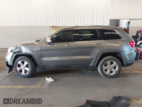 2012 Jeep Grand Cherokee Limited z VIN 1C4RJFBT9CC260334, wystawiony jako IAAI lot #42980030 z przebiegiem 186 641 mil mil oraz . Historia ofert i sprzedaży dostępna na DreamBid. Obrazek 14.