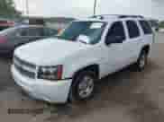 2007 Chevrolet Tahoe LTZ with VIN 1GNFC13017R113004, listed as a IAAI auction lot 43217116 with 161,939 mi miles and . Bid and sale history available at DreamBid. Image 2.