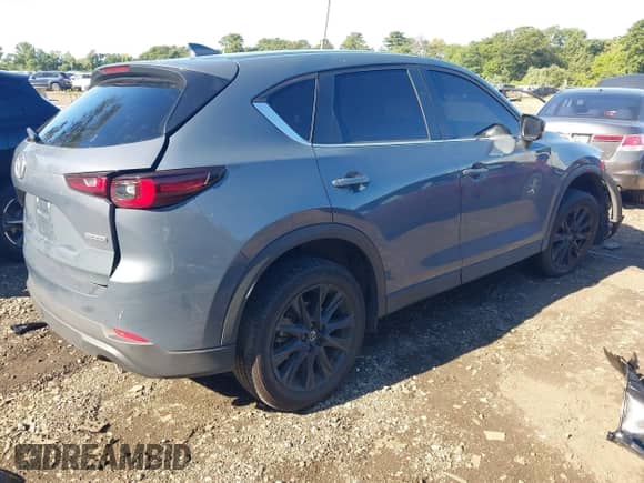 2025 Mazda CX-5 S Carbon Edition z VIN JM3KFBCM1S0584162, wystawiony jako IAAI lot #43044328 z przebiegiem 8 511 mil mil oraz . Historia ofert i sprzedaży dostępna na DreamBid. Obrazek 4.