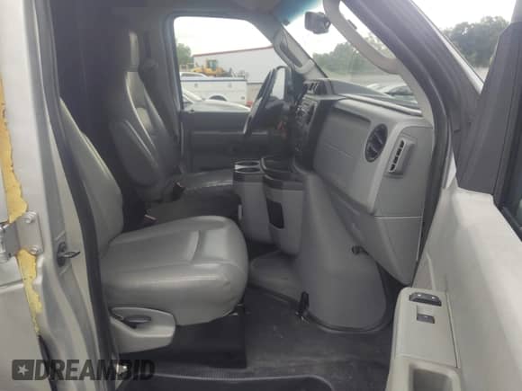 2012 Ford Econoline Cargo Commercial with VIN 1FTNE1EW0CDA89656, listed as a IAAI auction lot 42579010 with 204,112 mi miles and . Bid and sale history available at DreamBid. Image 5.