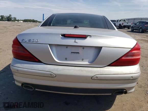 2003 Mercedes-Benz SL 500 z VIN WDBSK75F33F029923, wystawiony jako Copart lot #68968815 z przebiegiem 130 249 mil mil oraz Czysty tytuł • Clean title. Historia ofert i sprzedaży dostępna na DreamBid. Obrazek 6.