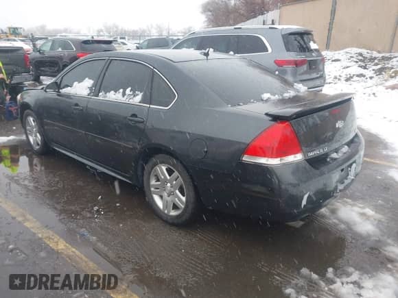 2012 Chevrolet Impala LT Retail with VIN 2G1WB5E37C1204932, listed as a IAAI auction lot 41629443 with 167,207 mi miles and . Bid and sale history available at DreamBid. Image 3.
