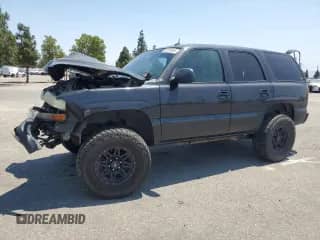 2003 Chevrolet Tahoe LT with VIN 1GNEC13T83R238405, listed as a Copart auction lot 65200955 with 185,442 mi miles and Salvage title. Bid and sale history available at DreamBid. Image 1.