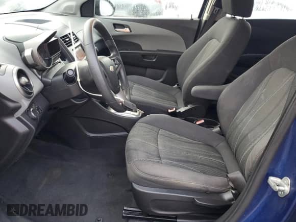 2013 Chevrolet Sonic LT с VIN 1G1JC6SB2D4201323, выставлен на аукционе Copart как лот 89554685 с пробегом 70 677 миль миль и Чистый • Clean title. История ставок и продаж доступна на DreamBid. Изображение 7.