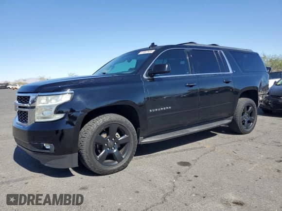 2017 Chevrolet Suburban LT z VIN 1GNSCHKCXHR233937, wystawiony jako Copart lot #67087925 z przebiegiem 170 969 mil mil oraz Szkoda całkowita • Salvage title. Historia ofert i sprzedaży dostępna na DreamBid. Obrazek 1.