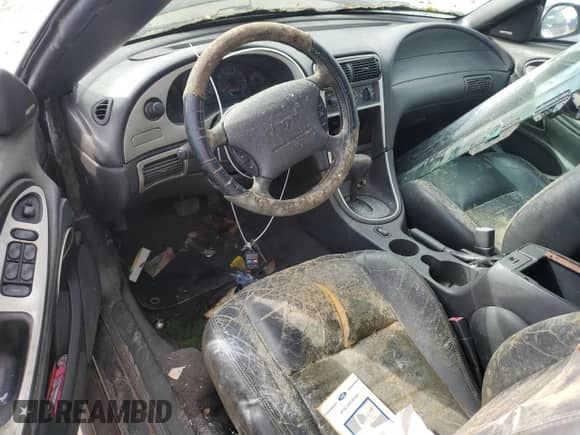 2002 Ford Mustang GT Deluxe z VIN 1FAFP45X02F129946, wystawiony jako Copart lot #51779885 z przebiegiem Nie podano mil oraz Szkoda całkowita • Salvage title. Historia ofert i sprzedaży dostępna na DreamBid. Obrazek 8.