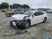 2024 Toyota Camry Hybrid LE z VIN 4T1H31AK5RU077576, wystawiony jako Copart lot #66674945 z przebiegiem 98 986 mil mil oraz Szkoda całkowita • Salvage title. Historia ofert i sprzedaży dostępna na DreamBid. Obrazek 1.