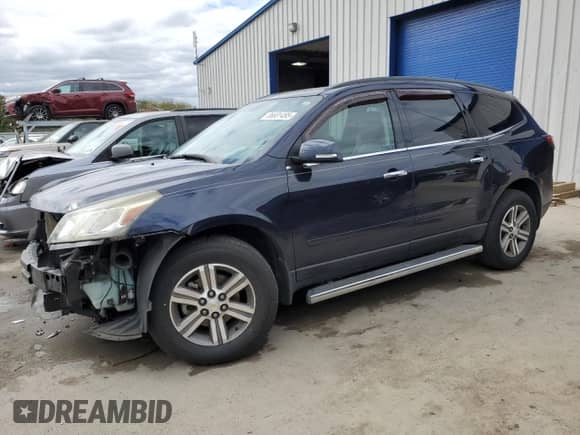 2015 Chevrolet Traverse LT with VIN 1GNKRHKD2FJ348129, listed as a Copart auction lot 85601495 with 102,579 mi miles and Salvage title. Bid and sale history available at DreamBid. Image 1.