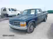 1996 Dodge Dakota with VIN 1B7GL23X2TS583075, listed as a IAAI auction lot 42049233 with 144,020 mi miles and . Bid and sale history available at DreamBid. Image 2.