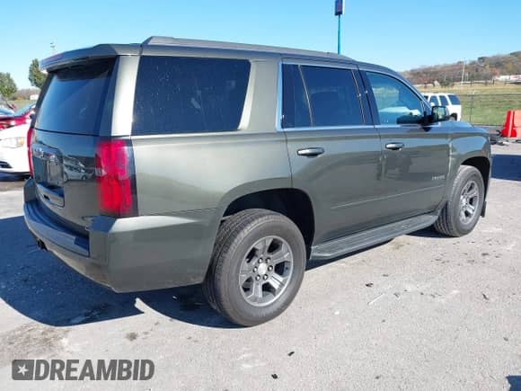 2019 Chevrolet Tahoe LS with VIN 1GNSKAKC4KR226743, listed as a IAAI auction lot 40839068 with 104,220 mi miles and . Bid and sale history available at DreamBid. Image 4.