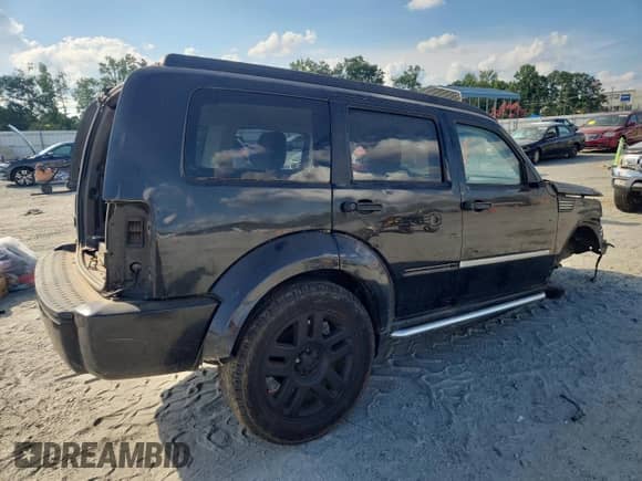 2008 Dodge Nitro SXT with VIN 1D8GT28K58W104310, listed as a Copart auction lot 65250315 with 253,366 mi miles and Salvage title. Bid and sale history available at DreamBid. Image 3.
