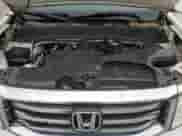 2014 Honda Pilot EX-L z VIN 5FNYF4H56EB056395, wystawiony jako Copart lot #87113095 z przebiegiem 175 241 mil mil oraz Czysty tytuł • Clean title. Historia ofert i sprzedaży dostępna na DreamBid. Obrazek 12.